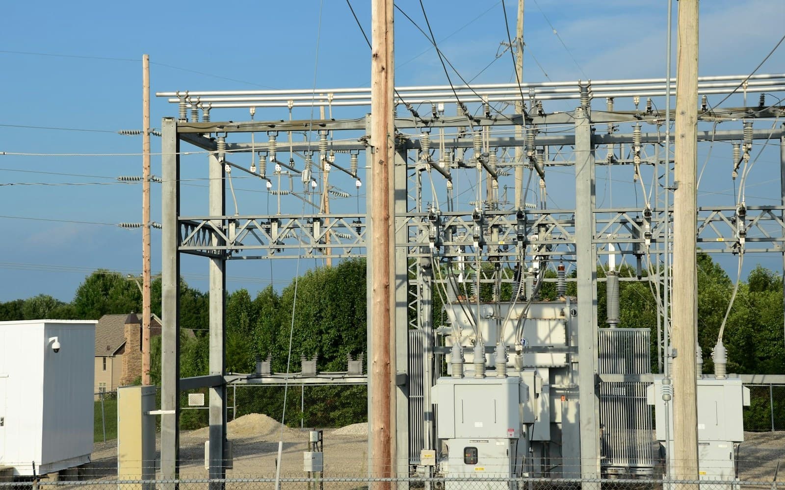 Electrical substation with transformer, switchgear and high-voltage insulators
