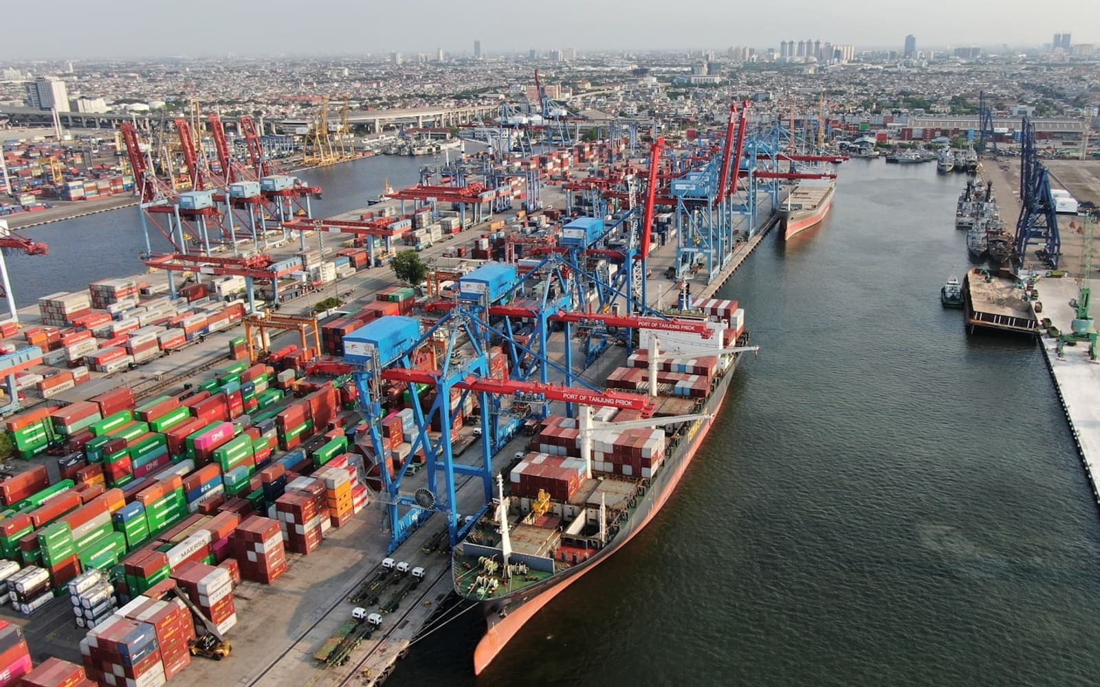 Container ship being loaded at a shipping port